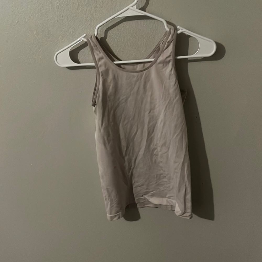 White tank top, okay condition, worn a little